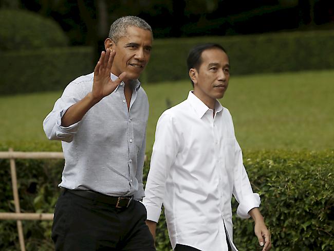 Ex-US-Präsident Barack Obama mit dem indonesischen Präsidenten Joko Widodo.