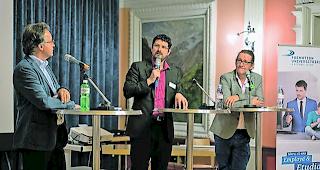 Die Podiumsdiskussion. Von links: Claude Hauser, Yannick Buttet und Gabriel Bender. 