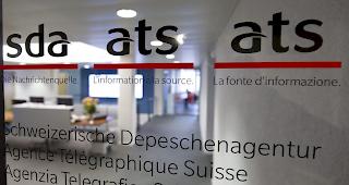 Wettbewerbsh&uuml;ter genehmigen Schulterschluss zwischen SDA und Keystone. 