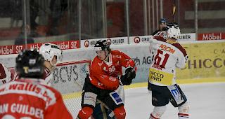 Visps Jules Sturny, Torsch&uuml;tze zum 4:1, setzt sich gegen den Tessiner Gionda Bionda durch.