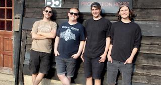 &laquo;The Meseeks&raquo; (v. l.):  Sebastian Mooser (git/voc), Neil Kennedy (recording/magic), Fr&eacute;d&eacute;ric Waldmann (bass/voc) und
Yannick Guntern (drums/voc)